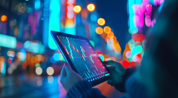 Investor analysiert BYD-Aktienkurs auf Tablet