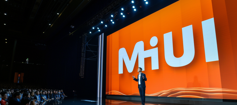 CEO von Xiaomi präsentiert neue Technologieinnovation auf einer großen Bühne mit prominentem Firmenlogo